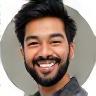 Avatar photo of Raj Samy, a man with a short beard smiling.